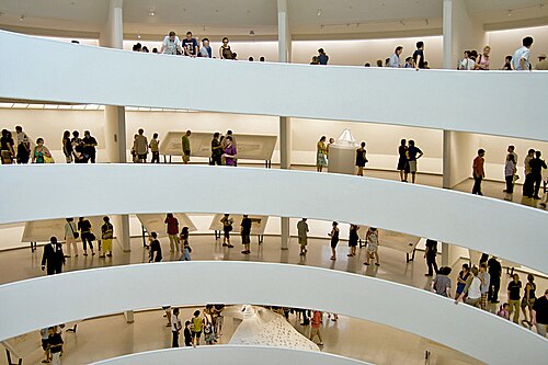 Visitors along the spiral ramps inside the Solomon R. Guggenheim Museum.