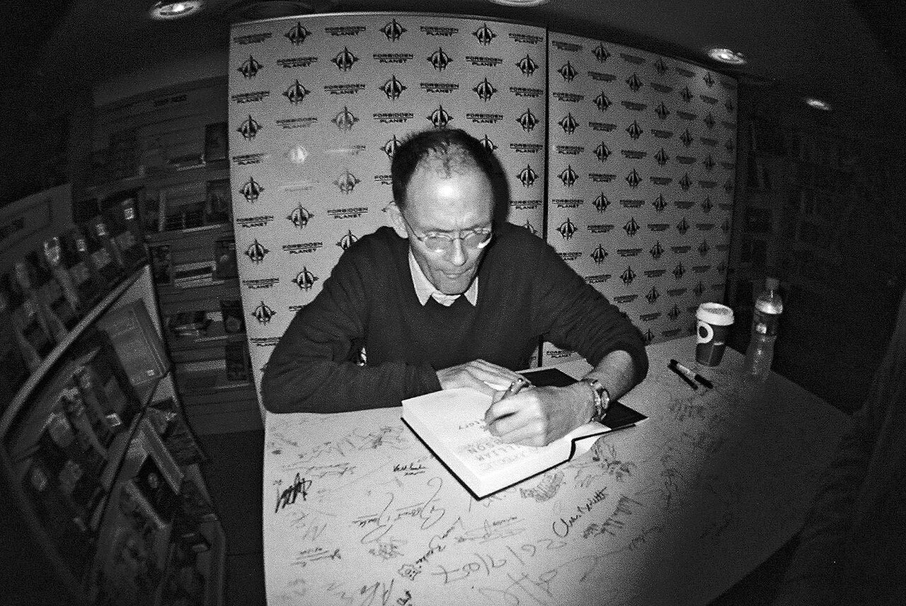 William Gibson signing a book in 2010.