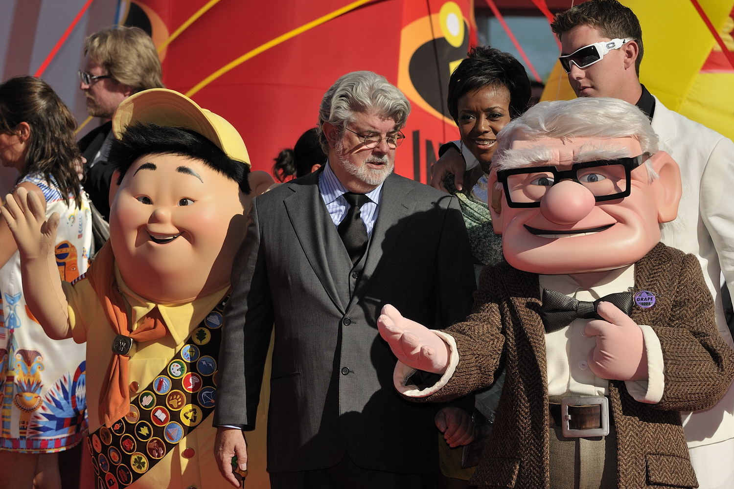 Pixar characters and attendees at the 66th Venice Film Festival.