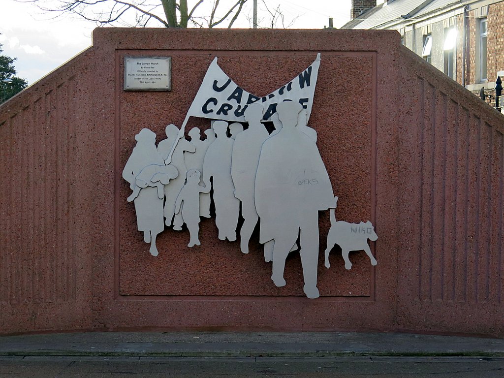 Memorial depicting Jarrow Crusade marchers at Jarrow Metro Station.