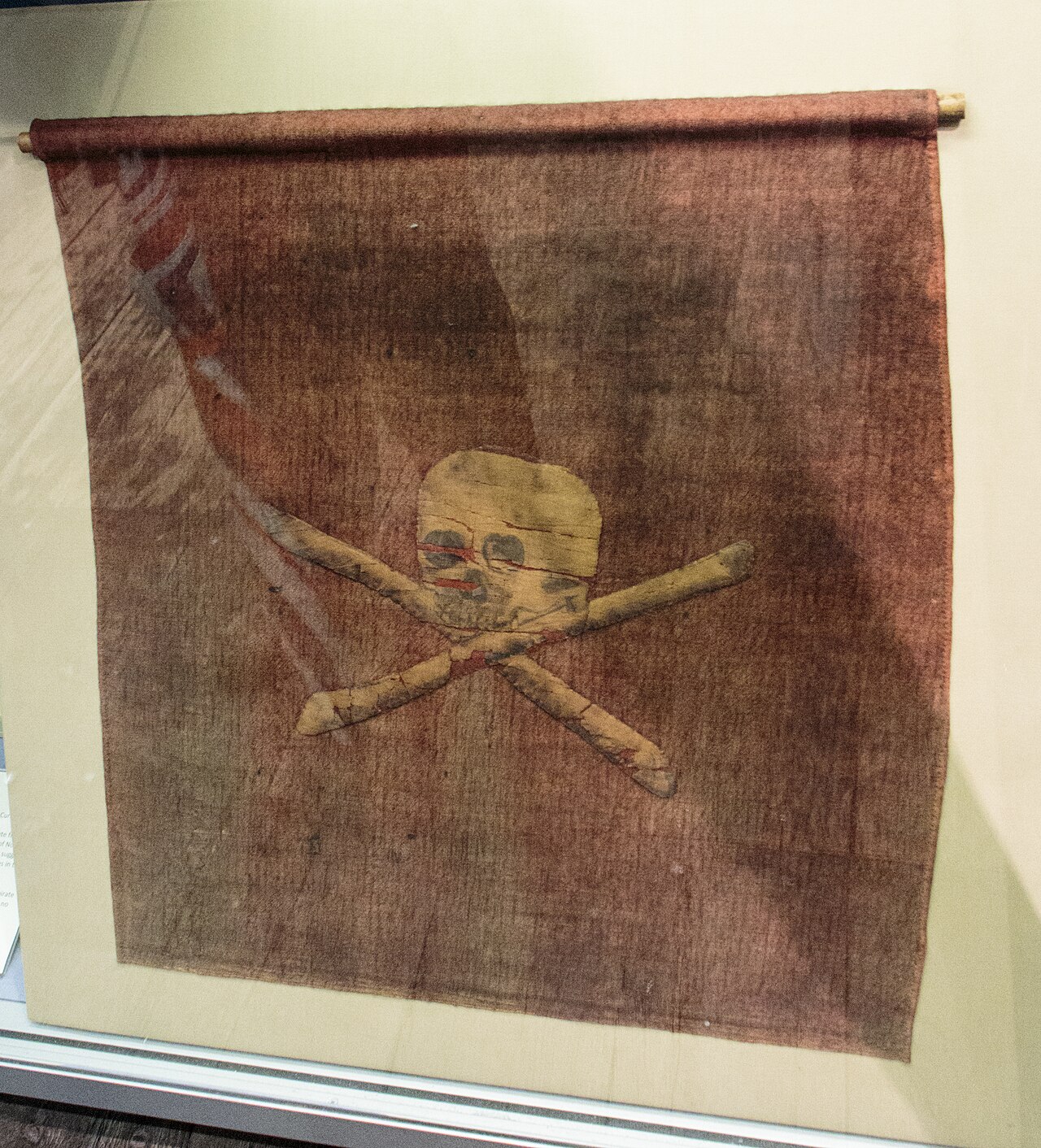 A rare 18th century red Jolly Roger, captured by the Royal Navy in 1780, on display at Portsmouth.