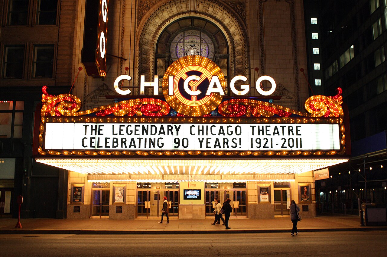 Lit marquee of the Chicago Theatre celebrating 90 years.