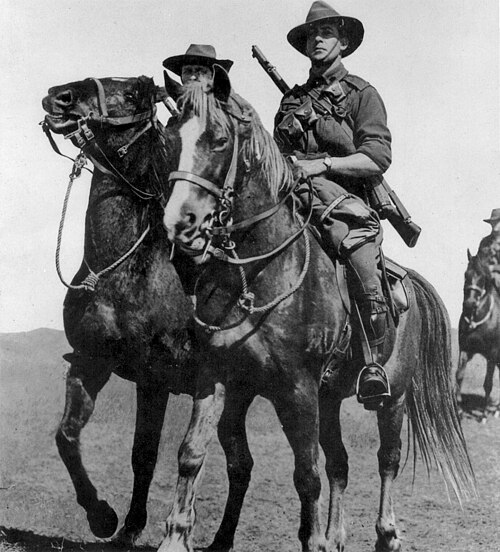 Mounted Australian light horsemen in uniform.