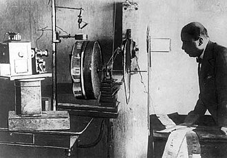 Hovannes Adamian with experimental mechanical television equipment, circa 1900s.