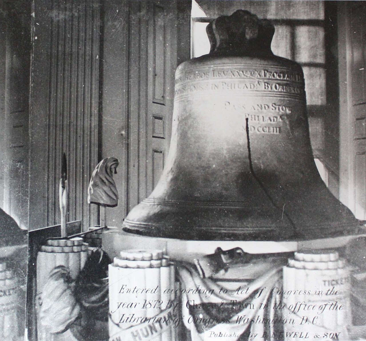 The Liberty Bell on an ornate stand in Independence Hall in 1872.